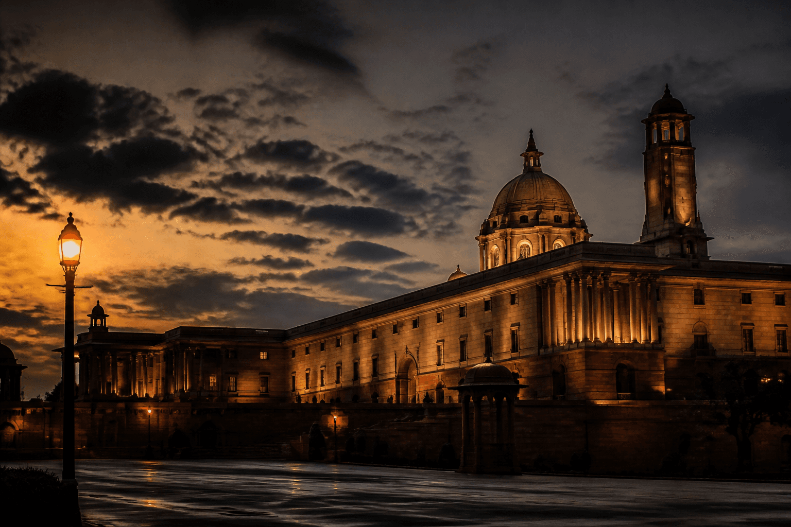 Parliament building under dramatic evening light